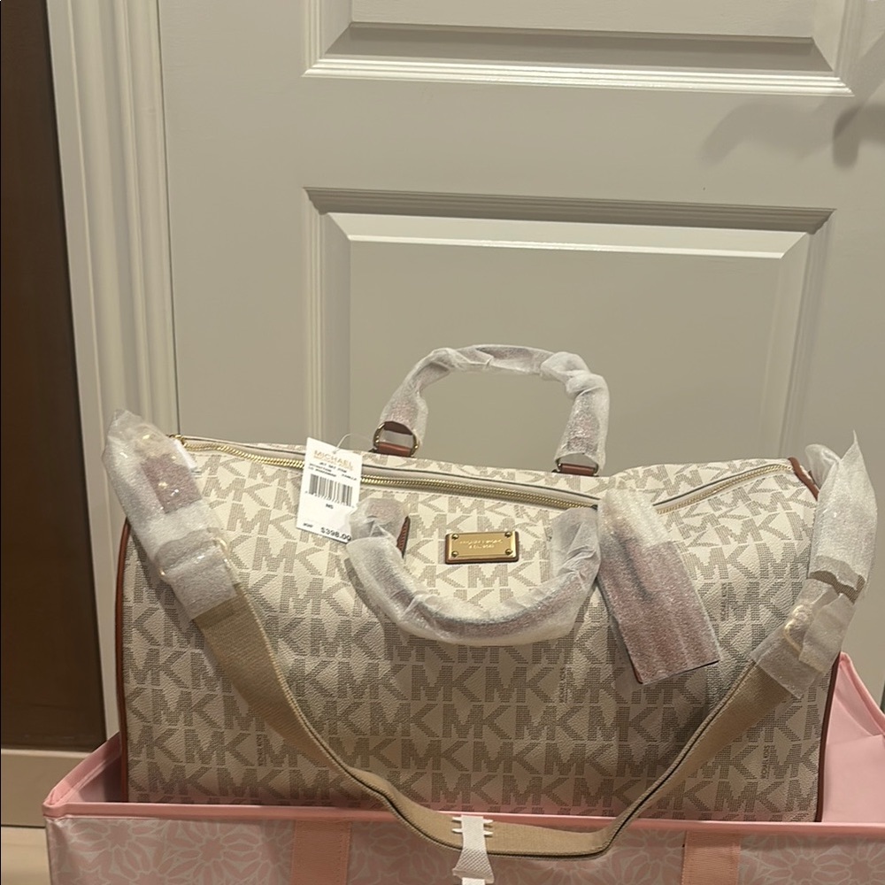 Michael Kors Cream Travel Bag with Gold Accents